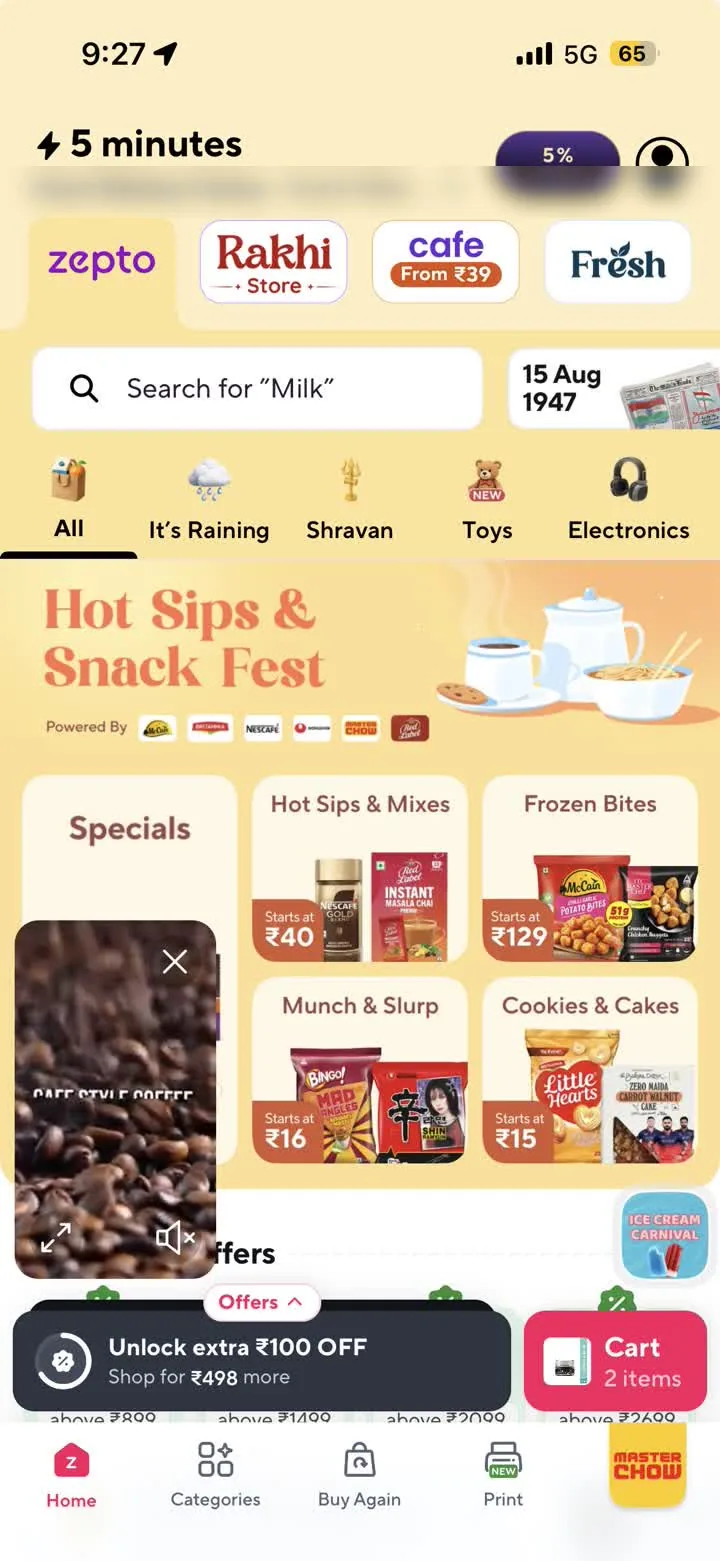 Zepto home: a delivery-time promise, store tabs, emoji category tabs, a campaign banner, category tiles each carrying a starting price, a persistent cart pill and a Buy Again tab.